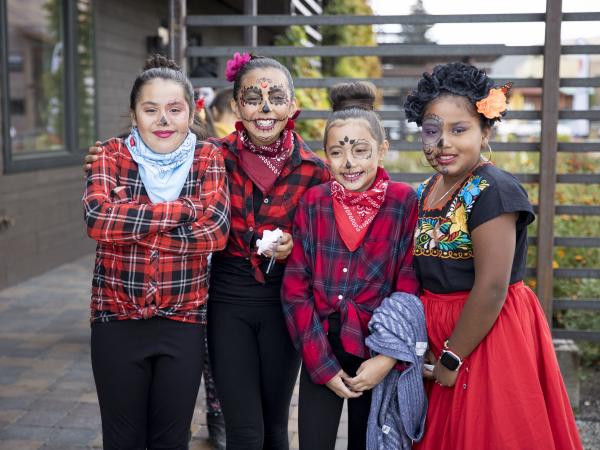 Girls in dia de los muertos makeup